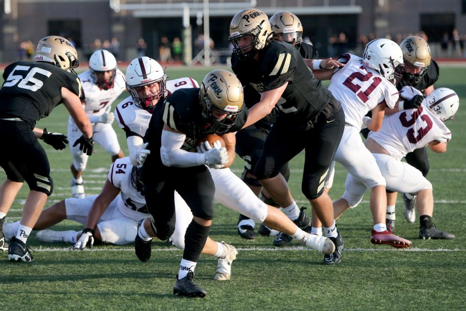 Penn running back Jacob Balis scores for the Kingsmen in the first half during the game Friday, Aug. 25, 2023, at the Mishawaka vs. Penn football game at Freed Field.