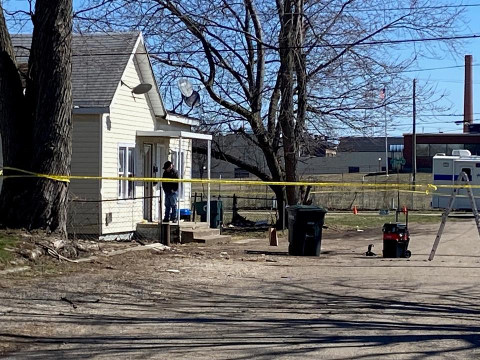 Muncie police officers on Wednesday afternoon remained at the scene of an early morning shooting death in the 1300 block of East 10th Street. Dispatchers receives reports of gunfire in the area about 3:20 a.m.