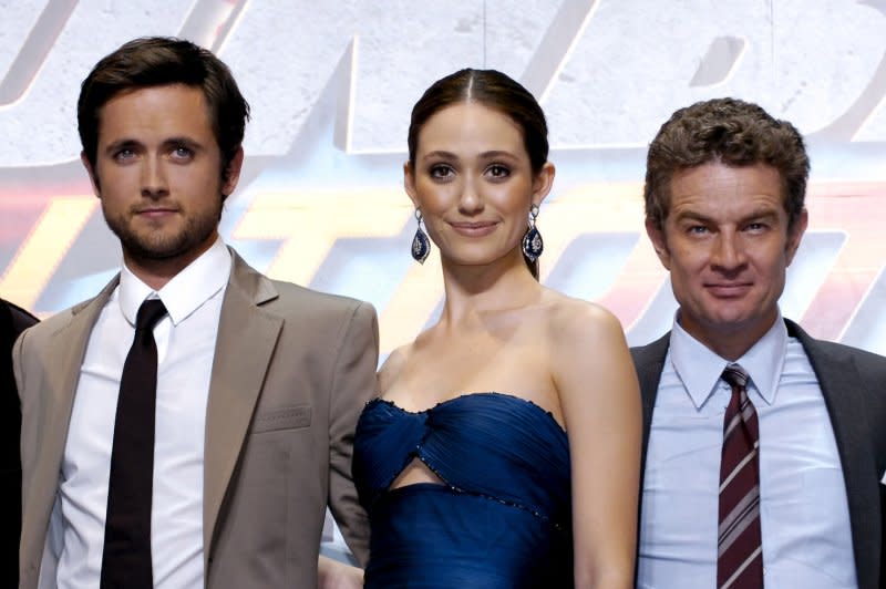 Left to right, Justin Chatwin, Emmy Rossum and James Marsters pose for cameras during the world premiere for the film "Dragonball Evolution" in Tokyo in 2009. File Photo by Keizo Mori/UPI