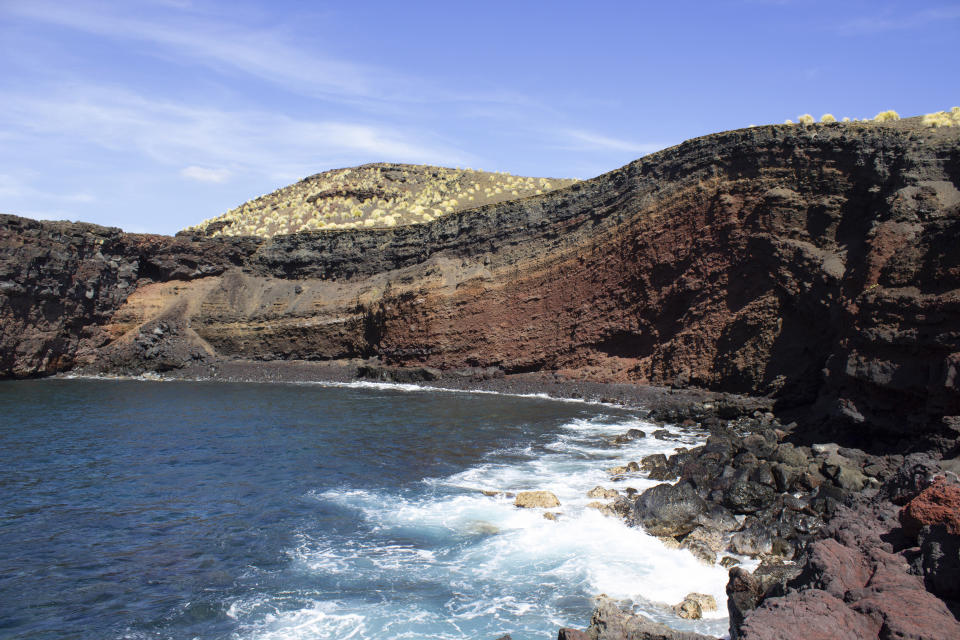 In this photo provided by the U.S. National Park Service, an area of Pohue Bay on Hawaii's Big Island is shown in 2021. Hawaii Volcanoes National Park on the Big Island on Tuesday, July 12, 2022, was given new land in a deal that will protect and manage an ocean bay area that is home to endangered and endemic species and to rare, culturally significant Native Hawaiian artifacts. (National Park Service via AP)