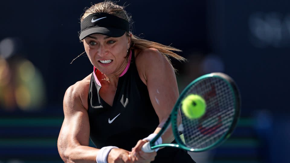 Badosa plays a backhand against Halep in their Miami Open first-round match. - Brennan Asplen/Getty Images