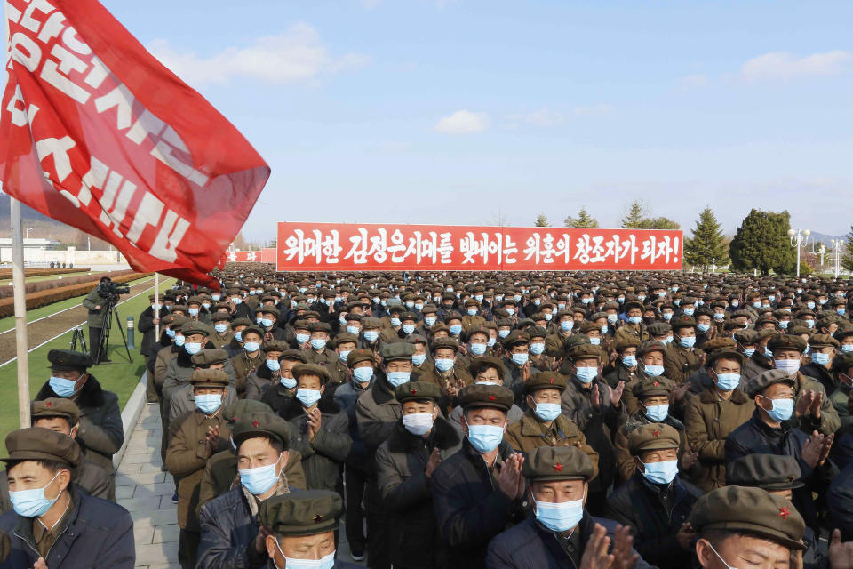 Members of North Korea's military divisions attend a meeting to pay respect to late leaders Kim Il Sung and Kim Jong Il at the Kumsusan Palace of the Sun in Pyongyang, North Korea, Friday, Nov. 20, 2020. (AP Photo/Jon Chol Jin)