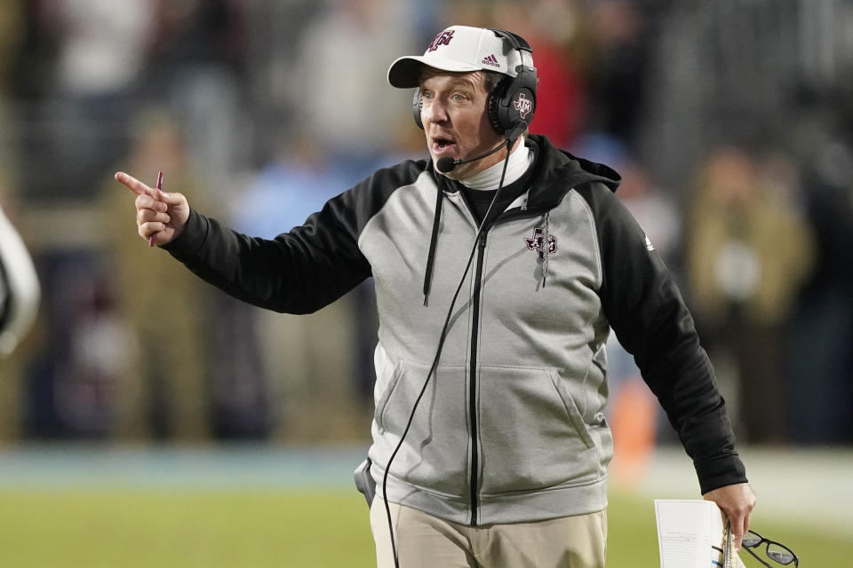 FILE - Texas A&M coach Jimbo Fisher reacts to an official's call during the second half of the team's NCAA college football game against Mississippi, Nov. 13, 2021, in Oxford, Miss. Texas A&M is set to kick off its season on Sept. 3, 2022, against Sam Houston State. (AP Photo/Rogelio V. Solis, File)