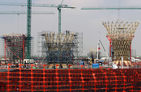 Employees work on the terminal area at the construction site of the new Mexico City International Airport in Texcoco on the outskirts of Mexico City, Mexico August 16, 2018. REUTERS/Henry Romero