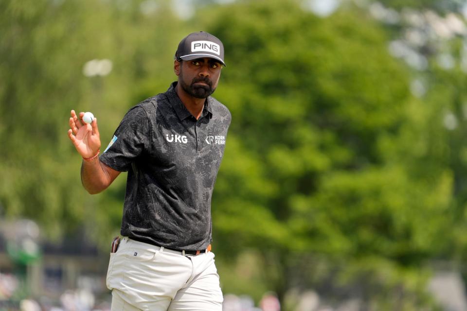 Sahith Theegala waves to the gallery after putting out on the third green during the third round of the TOUR Championship golf tournament. Mandatory Credit: John David Mercer-USA TODAY Sports