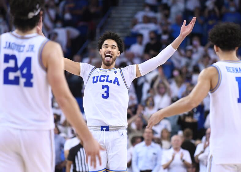 UCLA's Johnny Juzang celebrates in the final seconds of overtime against Villanova