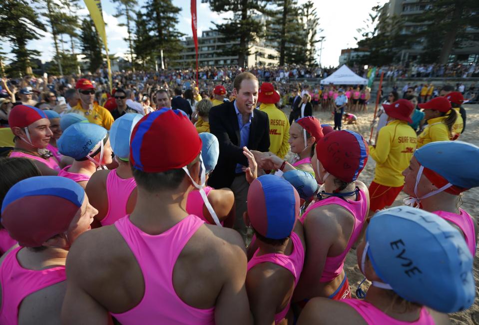 Catherine, the Duchess of Cambridge, talks to junior surf lifesavers during a visit to Sydney's Manly beach