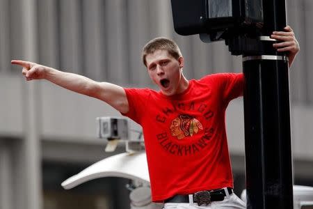 Jun 18, 2015; Chicago, IL, USA; Chicago Blackhawks fans cheer during the 2015 Stanley Cup championship parade and rally at Soldier Field. Mandatory Credit: Jon Durr-USA TODAY Sports