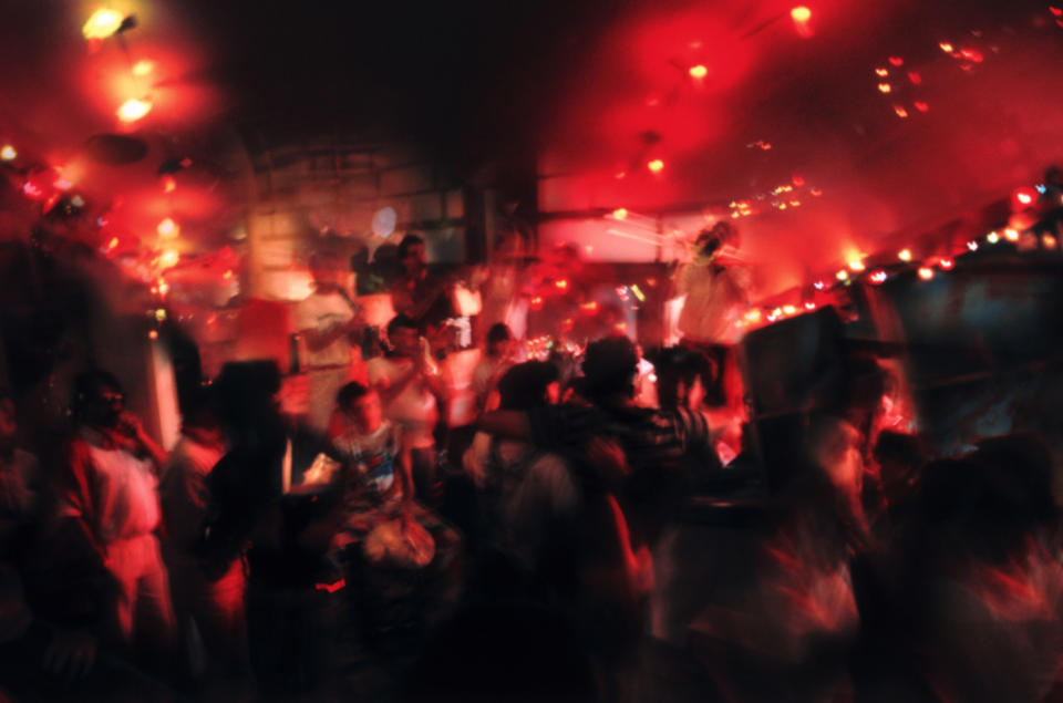 Fuzzy image of people in a club