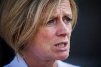 Alberta Premier Rachel Notley speaks to the media after visiting residents of Fort McMurray, who have assembled in a community centre in Anzac, Alberta, after their city was evacuated due to a massive wildfire, May 4, 2016. REUTERS/Topher Seguin