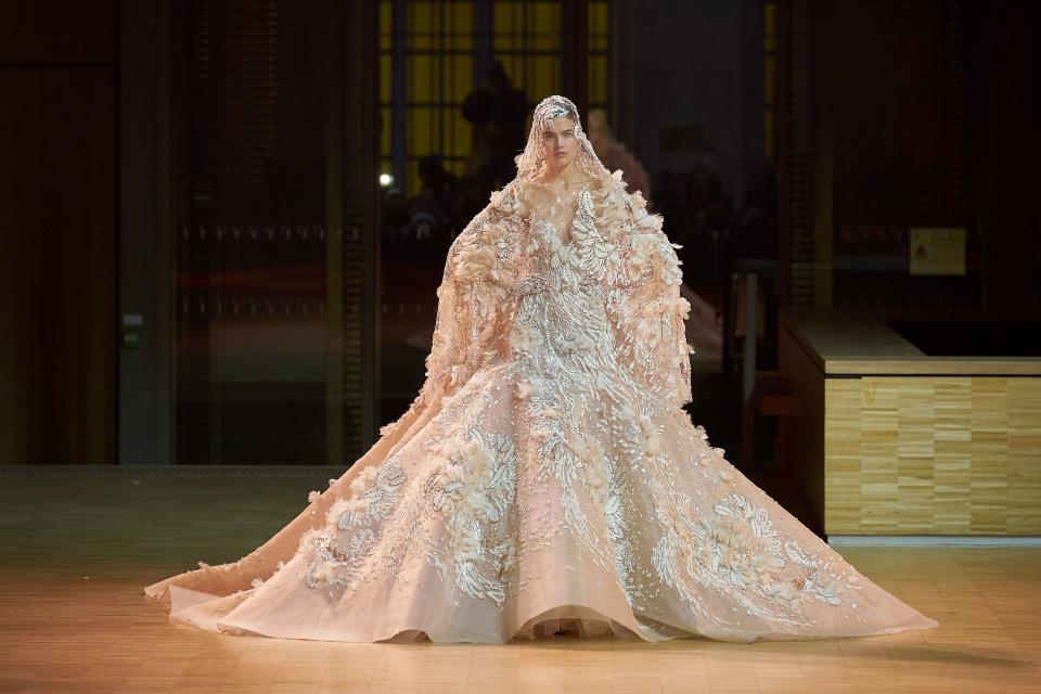 <p class="body-dropcap">The spring/summer 2022 couture collections were presented this week in Paris and, as well as plenty of inspiration for the upcoming awards season, there were also more than a few wedding-worthy gowns that are sure to turn the heads of any bride-t0-be.</p><p>From enormous princess gowns to slinky silk numbers, layers of tulle and the most intricate embroidery, there was much in the way of wedding-dress inspiration from the likes of Dior, Chanel, Elie Saab, Zuhair Murad and more. Below, we round up some of the most beautiful bridal gowns we saw on the SS22 couture catwalks.</p><p>For more from the season, <a href="https://www.harpersbazaar.com/uk/fashion/shows-trends/g25978918/best-couture-fashion-week/" rel="nofollow noopener" target="_blank" data-ylk="slk:see our catwalk round-up here;elm:context_link;itc:0;sec:content-canvas" class="link ">see our catwalk round-up here</a>, and check out <a href="https://www.harpersbazaar.com/uk/fashion/shows-trends/g15839315/couture-fashion-week-celebrities-front-row/" rel="nofollow noopener" target="_blank" data-ylk="slk:who has been sitting on the front row, right here;elm:context_link;itc:0;sec:content-canvas" class="link ">who has been sitting on the front row, right here</a>.</p>