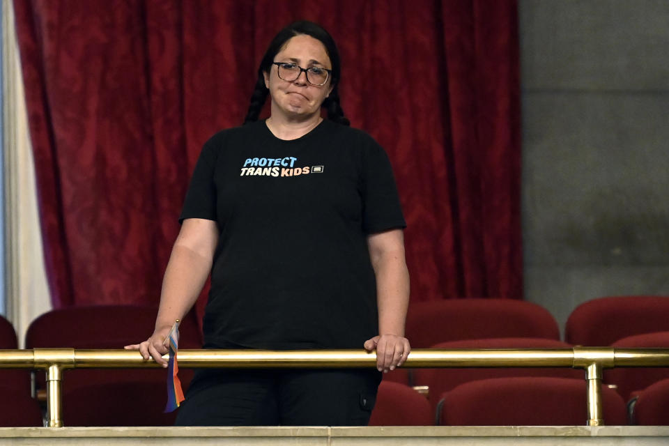 A protester reacts from the House gallery as Rep. Mary Littleton, R-Dickson, talks about her bill that would require parents are notified of a student's gender identity or intention to transition to a gender different from the person's sex at birth during a legislative session Monday, April 15, 2024, in Nashville, Tenn. (AP Photo/Mark Zaleski)