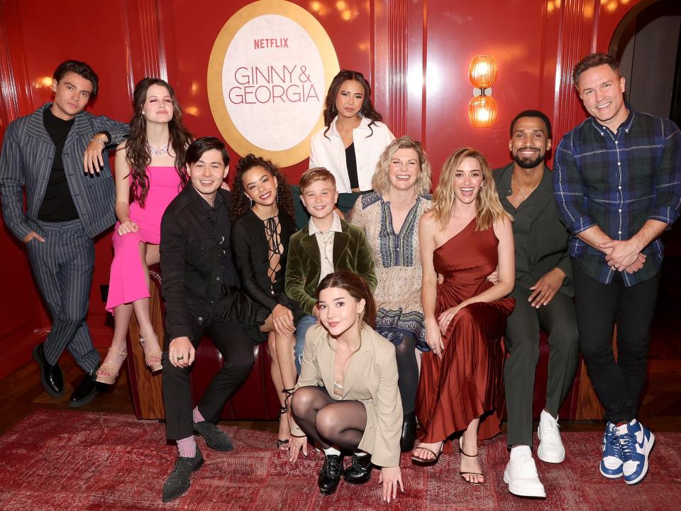 Felix Mallard, Sara Waisglass, Mason Temple, Antonia Gentry, Katie Douglas, Diesel La Torraca, Chelsea Clark, Jennifer Robertson, Brianne Howey, Nathan Mitchell and Scott Porter attend Netflix's "Ginny & Georgia" S2 celebratory dinner at Catch Steak on December 07, 2022 in Los Angeles, California