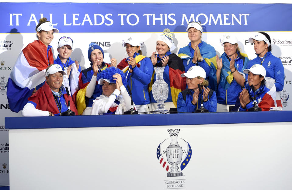Team Europe's Suzann Pettersen, bottom left, announces her retirement in the post match press conference following Team Europe's victory in the Solheim Cup against the US at Gleneagles, Auchterarder, Scotland, Sunday, Sept. 15, 2019. (Ian Rutherford/PA via AP)