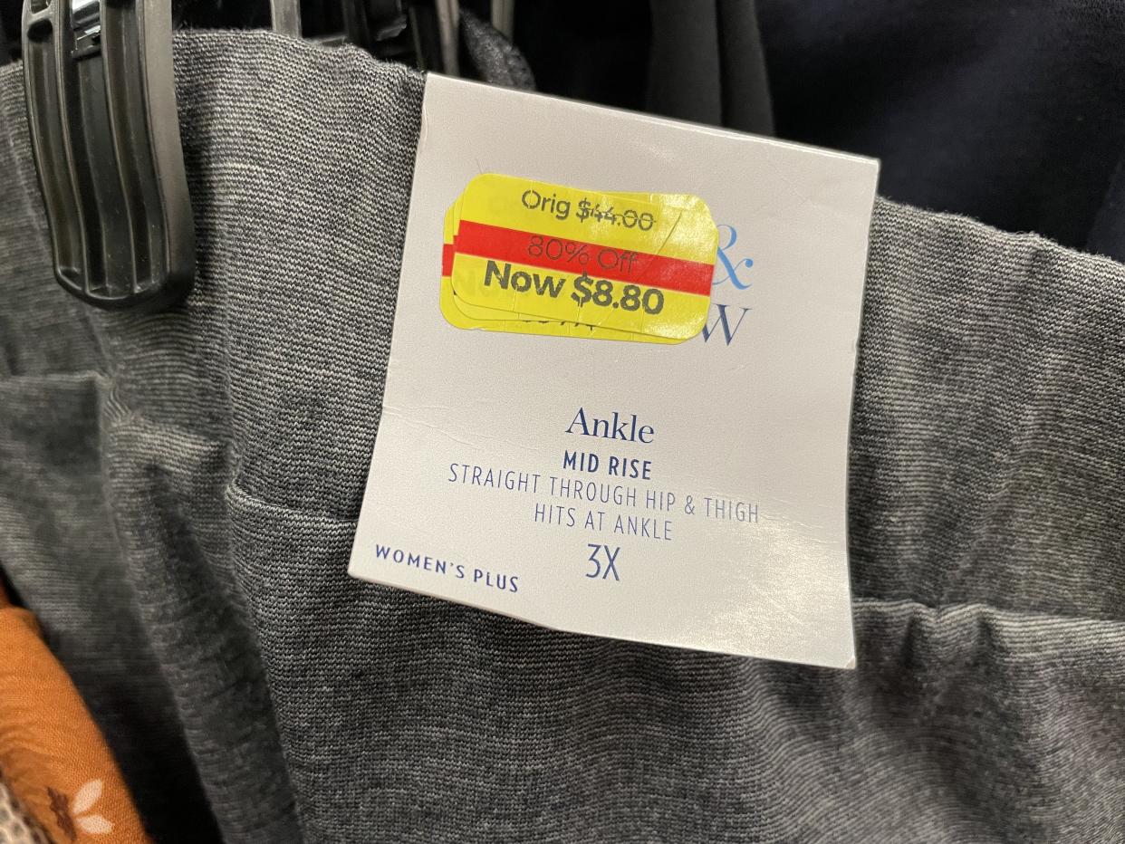 Looking at the sticker layout, this garment has been marked down three times and is still sitting on the rack.