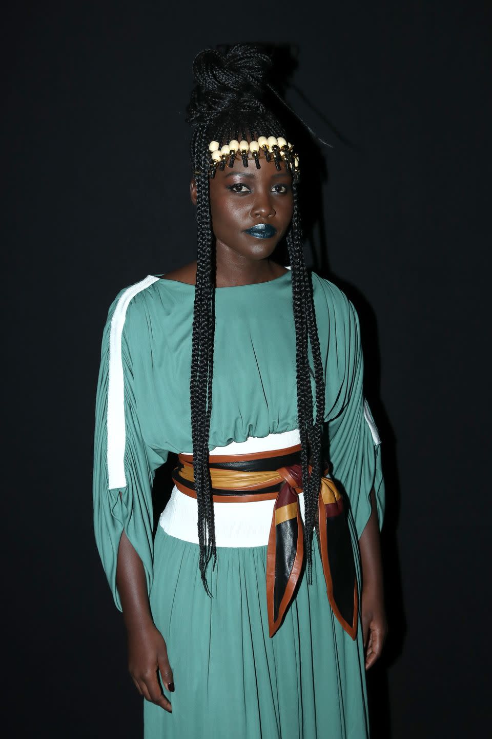 <p>Throw your braids up into a messy bun like actress Lupita Nyong’o for an effortlessly chic vibe.</p>
