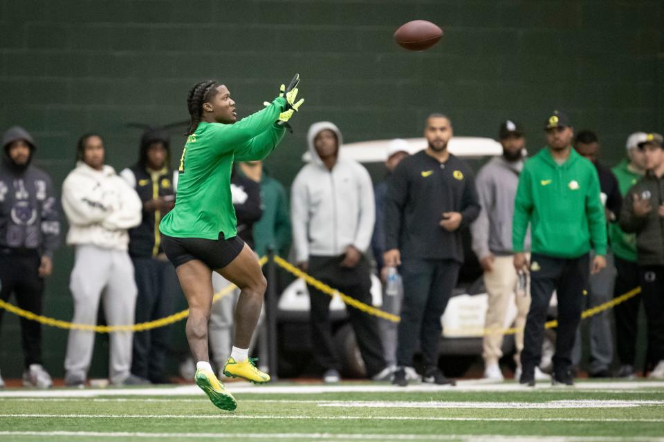 Oregon running back Bucky Irving catches a pass during Oregon Pro Day Tuesday, March 12, 2024 at the Moshofsky Center in Eugene, Ore.