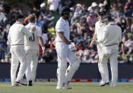 India's Hanuma Vihari, centre, walks from the field after he was dismissed by New Zealand's Neil Wagner during play on day one of the second cricket test between New Zealand and India at Hagley Oval in Christchurch, New Zealand, Saturday, Feb. 29, 2020. (AP Photo/Mark Baker)