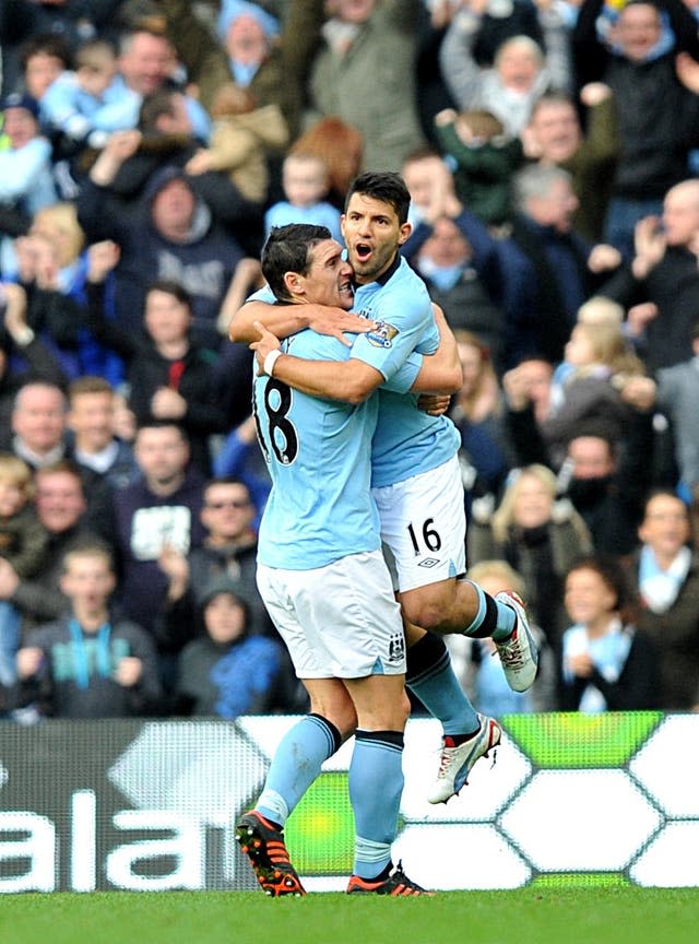 Barry (left) won a Premier League title with Manchester City