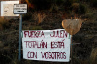FILE PHOTO: A banner that reads "Force Julen! Totalan is with you", is seen at the area where Julen, a Spanish two-year-old boy fell into a deep well four days ago when the family was taking a stroll through a private estate, in Totalan, southern Spain, January 17, 2019. REUTERS/Jon Nazca/File Photo