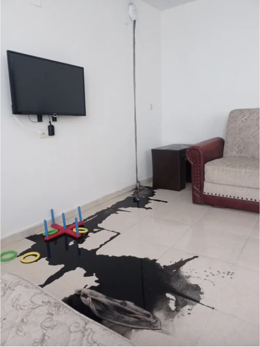 Black liquid all over the floor