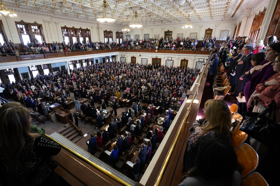 Texas House members with family and guests crowd the House Chamber at the Texas Capitol for the opening of the 88th Texas Legislative Session in Austin, Texas, Tuesday, Jan. 10, 2023. (AP Photo/Eric Gay)