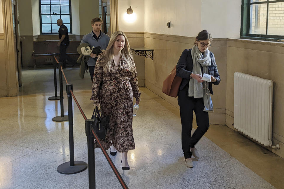 Publicist Haleigh Breest arrives at court in the Manhattan borough of New York City, on Wednesday, Oct. 19, 2022. Jurors are getting their first look at a lawsuit that pits Oscar-winning moviemaker Paul Haggis against Breest, who alleges that he raped her. He says their 2013 encounter was consensual. (AP Photo/Ted Shaffrey)