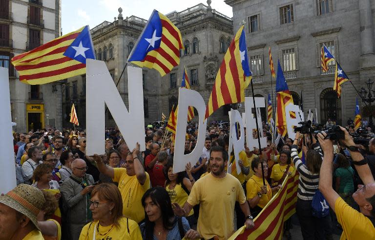 Pro-independence Catalans celebrate in Barcelona's Sant Jaume square on September 27, 2014