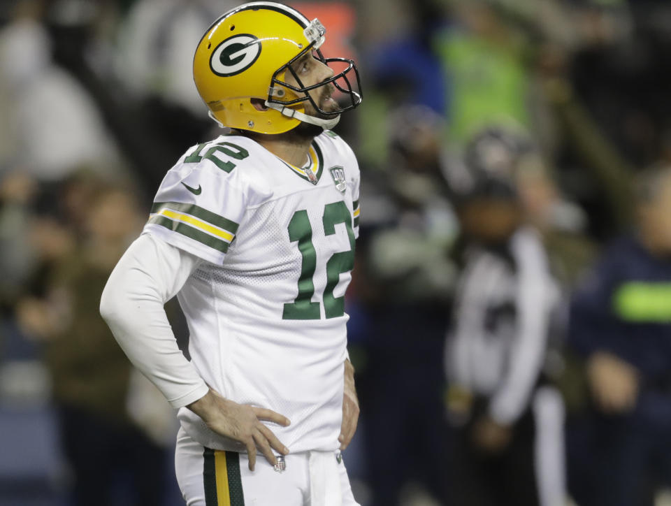 Green Bay Packers quarterback Aaron Rodgers looks up during the second half of an NFL football game against the Seattle Seahawks, Thursday, Nov. 15, 2018, in Seattle. The Seahawks won 27-24. (AP Photo/Stephen Brashear)