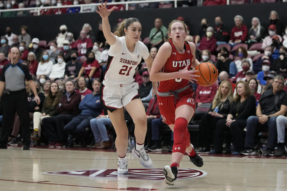 Utah guard Gianna Kneepkens, right, drives to the basket while defended by Stanford guard Brooke Demetre during the first half of an NCAA college basketball game in Stanford, Calif., Friday, Jan. 20, 2023. (AP Photo/Godofredo A. Vásquez)