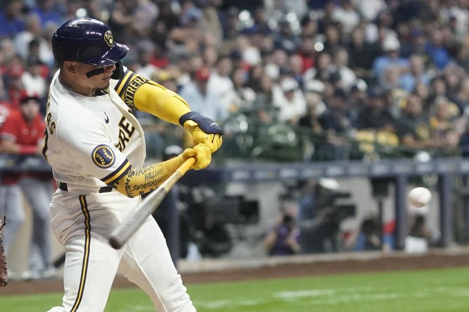 Milwaukee Brewers' William Contreras hits a single during the third inning of a baseball game against the St. Louis Cardinals Tuesday, Sept. 26, 2023, in Milwaukee. (AP Photo/Morry Gash)