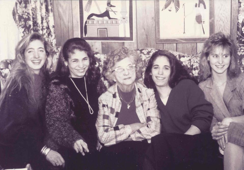 The Bessette sisters and cousin Abbi flank their grandmother Anna Bessette.