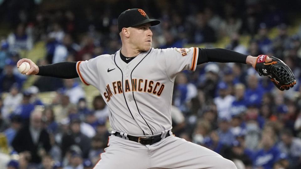 San Francisco Giants pitcher Anthony DeSclafani throws against the Dodgers.