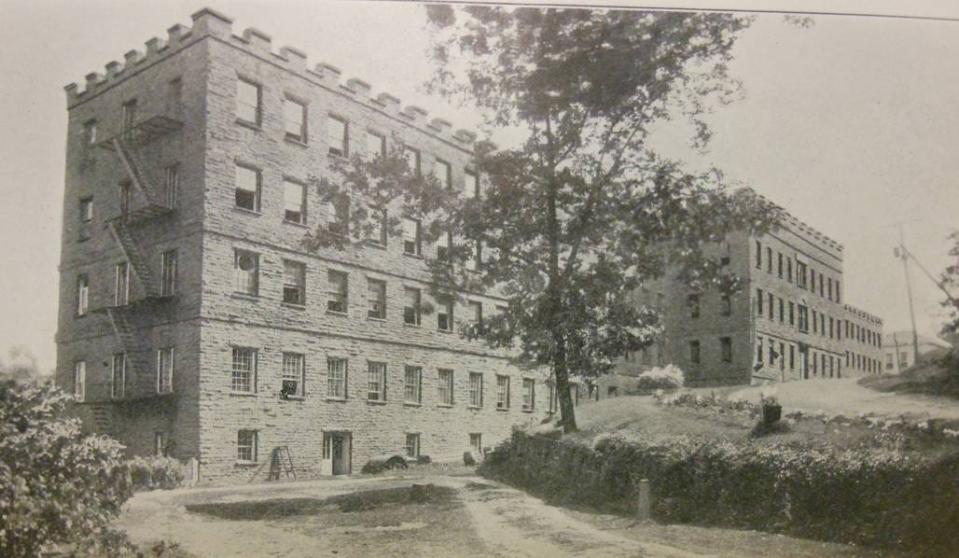 Charles Schumann worked at one of Hawley's silk mills, and may well have been employed here at Bellemonte Silk Mill, a short distance from his house in Hawley. Built in 1880, the mill was powered by the waterfalls in back and employed several hundred people. It was the largest of many silk or textile manufacturing businesses in the Hawley area and was owned by Dexter, Lambert & Company. Rebuilt after a devastating fire in 1894, in 1914 it became Welwood Silk Mill. It was Sherman Mills when it closed in the 1980s, reopening as Castle Antiques & Reproductions in 1990. In 2010 it reopened as Hawley Silk Mill, with a community college, professional offices and services, brewery, art galleries and retail shops. Louis Hensel photo. The bluestone landmark is on the National Register of Historic Places.