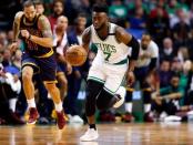 May 25, 2017; Boston, MA, USA; Boston Celtics forward Jaylen Brown (7) dribbles the basket up the court in front of Cleveland Cavaliers guard Deron Williams (31) during the second quarter of game five of the Eastern conference finals of the NBA Playoffs at the TD Garden. Mandatory Credit: Greg M. Cooper-USA TODAY Sports