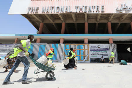 Construction workers take part in the renovation project of Somalia's National Theatre in Mogadishu, Somalia February 3, 2019. Picture taken February 3, 2019. REUTERS/Feisal Omar