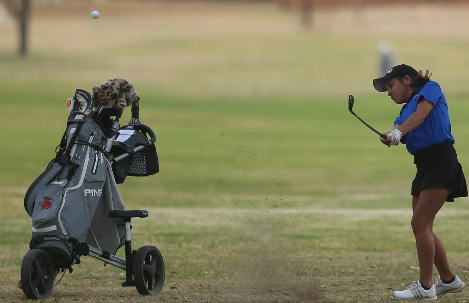 San Angelo Central High School's Emily Coronado hits an approach shot during the final round of the District 2-6A Girls Golf Tournament at Bentwood Country Club on Tuesday, March 29, 2022.