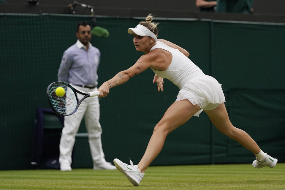 Czech Republic's Marketa Vondrousova in action against Jessica Pegula of the US during their women's singles match on day nine of the Wimbledon tennis championships in London, Tuesday, July 11, 2023. (AP Photo/Alberto Pezzali)