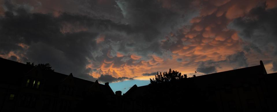 Unusual cloud formations hang over the College of Wooster campus Wednesday night. Wayne and Holmes counties experienced a brief rainstorm and a tornado warning was issued just before 9 p.m.