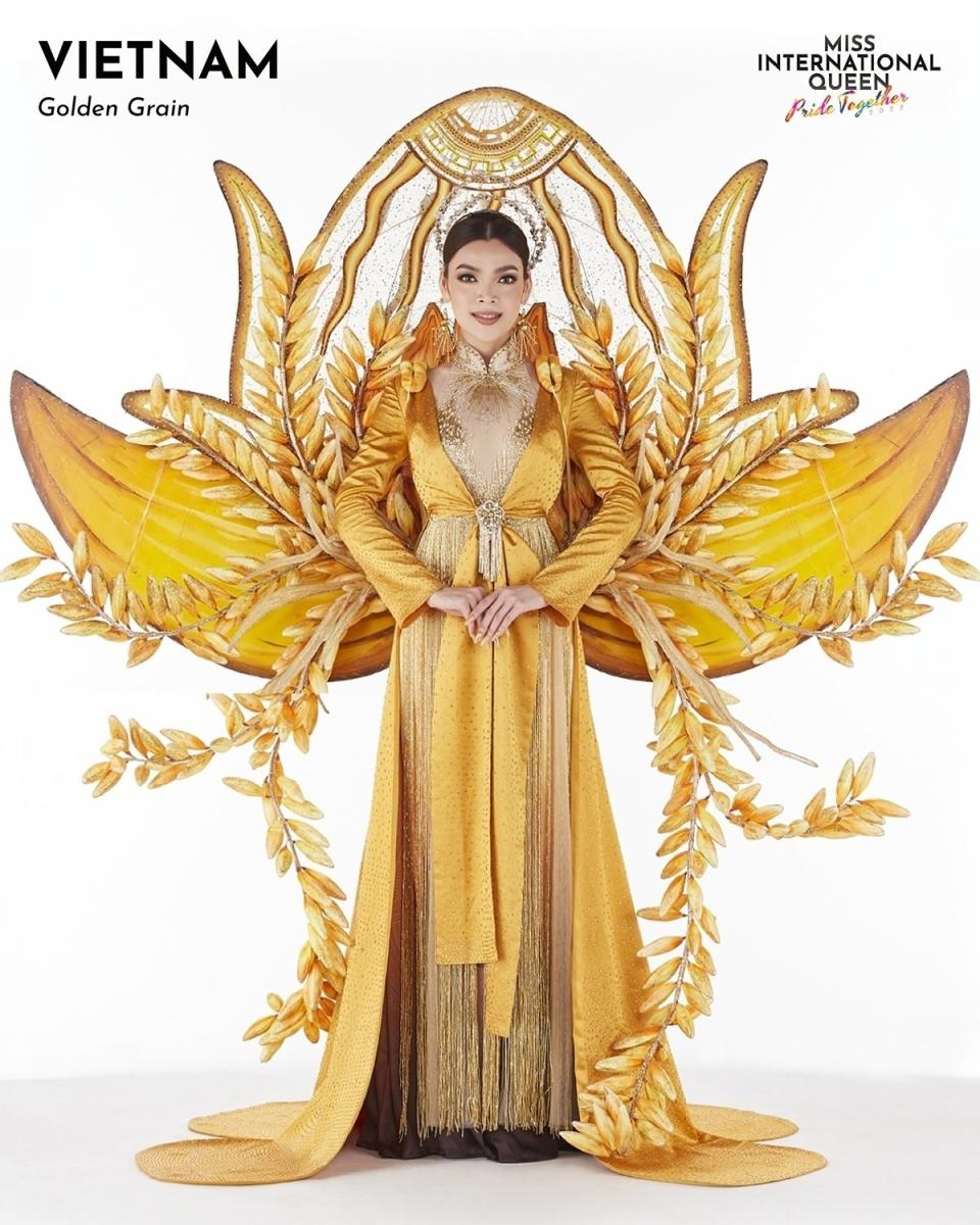 Miss Vietnam in a gold dress with gold wings