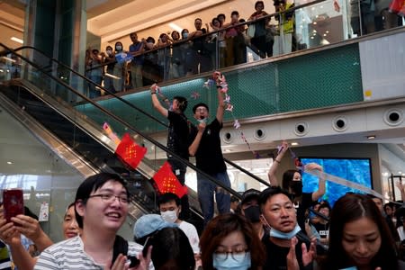 Anti-government protesters hold a rally in a shopping mall in Sha Tin, Hong Kong, China