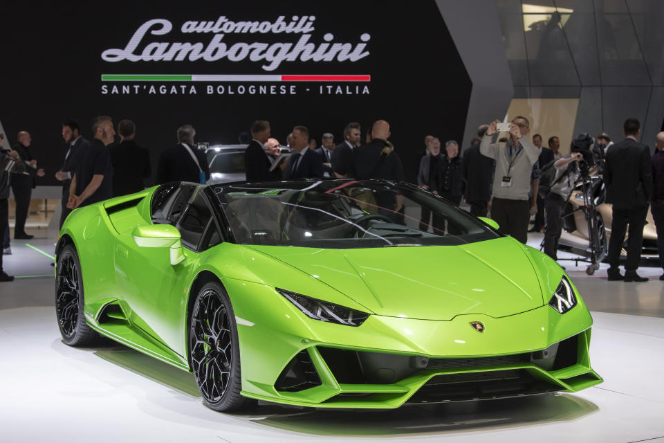 The Lamborghini Huracan EVO Spyder is presented during the press day at the '89th Geneva International Motor Show' in Geneva, Switzerland, Tuesday, March 5, 2019. The 'Geneva International Motor Show' takes place in Switzerland from March 7 until March 17, 2019. Automakers are rolling out new electric and hybrid models at the show as they get ready to meet tougher emissions requirements in Europe - while not forgetting the profitable and popular SUVs and SUV-like crossovers. (Martial Trezzini/Keystone via AP)