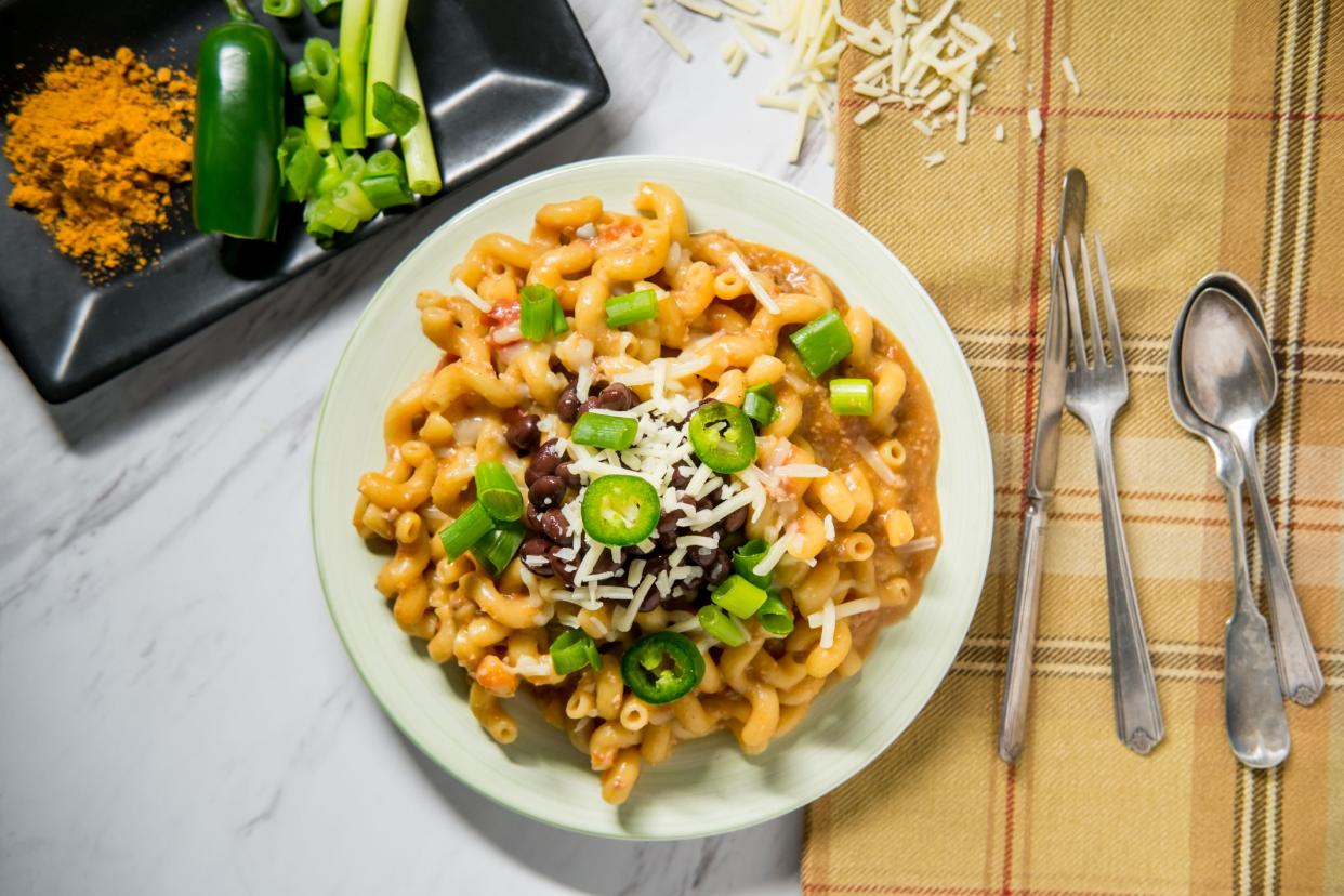 Fancy taco macaroni and cheese with black beans jalapenos and white cheddarFancy taco macaroni and cheese with black beans jalapenos and white cheddar