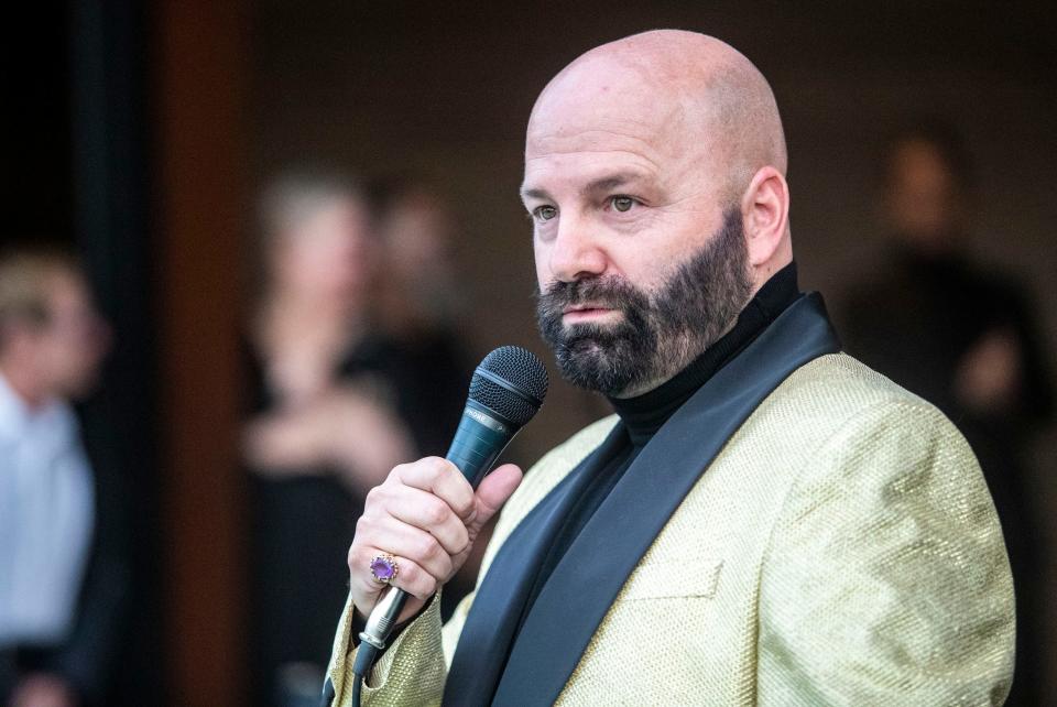 Michael Nickerson-Rossi, artistic director of Nickerson-Rossi Dance, speaks in celebration of Gene Kelly during a party at Frank Sinatra's Twin Palms estate in Palm Springs on Saturday, Feb. 26, 2022.