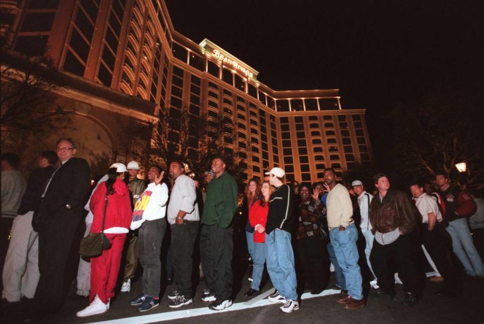 Patrons stand in line to get into the Beau Rivage casino for opening night in March 1999. Police estimated about 1,000 people stood in front of the casino for up to three hours to get in after the midnight opening and another 2,000 were in line in the parking garage. JOHN FITZHUGH/Sun Herald file