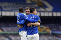 LIVERPOOL, ENGLAND - OCTOBER 17: Michael Keane (C) of Everton celebrates his goal with James Rodriguez and Abdoulaye Doucoure (L) during the Premier League match between Everton and Liverpool at Goodison Park on October 17 2020 in Liverpool, England. (Photo by Tony McArdle/Everton FC via Getty Images)