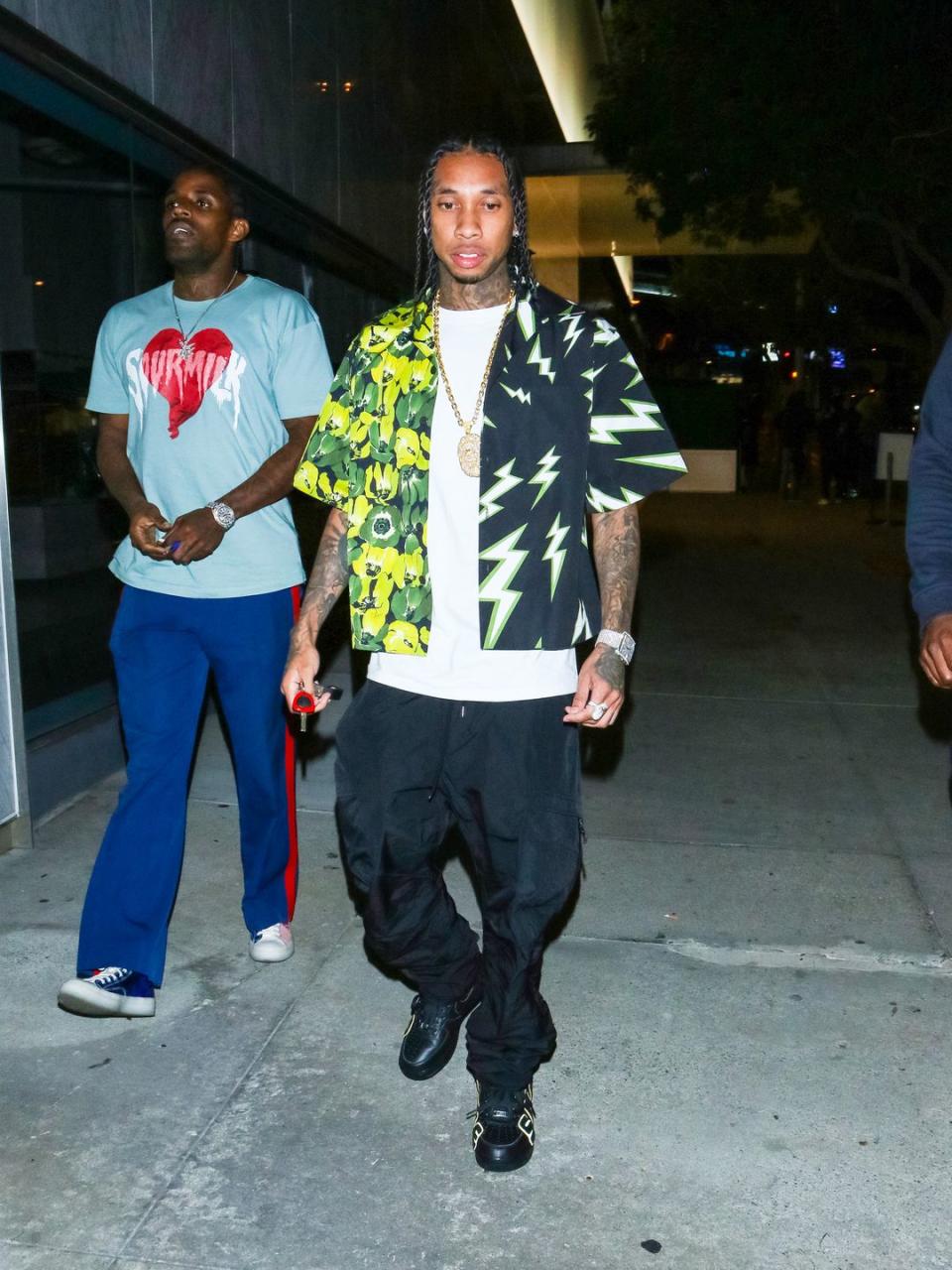 <p>Finally, a two-sided Tyga hit that doesn't involve a Nicki Minaj guest appearance. It's Prada instead, with the rapper opting for the label's now iconic half-and-half print.<br></p>