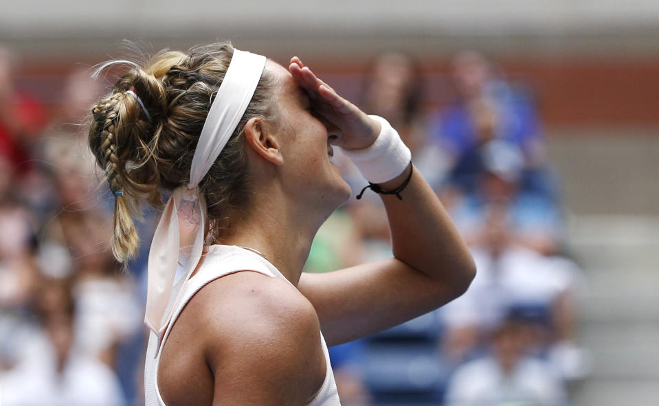 Victoria Azarenka, of Belarus, reacts against Sloane Stephens during the third round of the U.S. Open tennis tournament, Friday, Aug. 31, 2018, in New York. (AP Photo/Jason DeCrow)