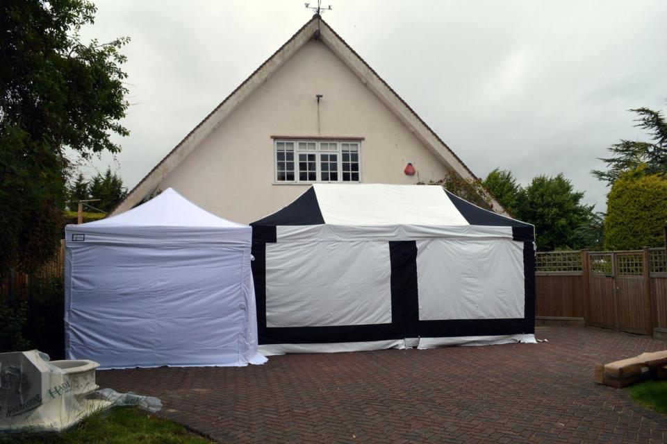 A forensic tent set up at the home in Hertfordshire (Hertfordshire Constabulary/PA)