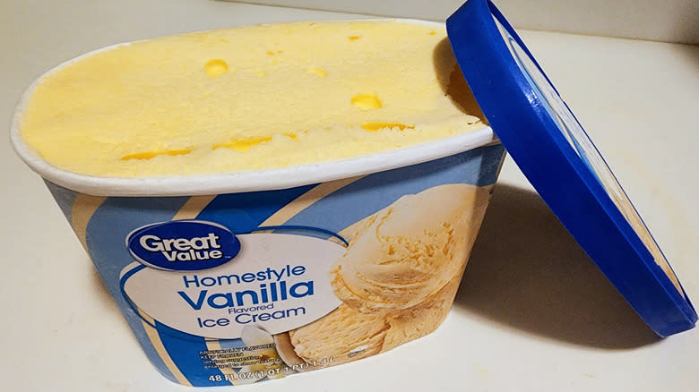 Open tub of vanilla ice cream